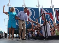 Republican presidential candidate Mitt Romney and his wife Ann greet supporters during a campaign rally on September 1, in Jacksonville, Florida. Romney and President Barack Obama derided each other's record on job creation as they made a fresh push through key battleground states