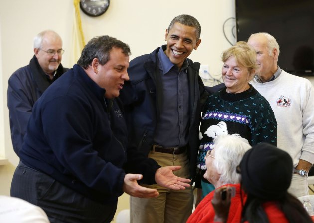 President Barack Obama, center, and Federal Emergency Management (FEMA) administrator Craig Fugate, left, watch as New Jersey Gov. Chris Christie, second from left, meets with local residents at Brigantine Beach Community Center, Wednesday, Oct. 31, 2012, in Brigantine, NJ. Obama traveled to Atlantic Coast to see first-hand the relief efforts after Superstorm Sandy damage the Atlantic Coast. (AP Photo/Pablo Martinez Monsivais)