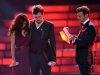 Finalists Jessica Sanchez, left, and Phillip Phillips, center, listen as host Ryan Seacrest announces the winner onstage at the "American Idol" finale on Wednesday, May 23, 2012 in Los Angeles. (Photo by John Shearer/Invision/AP)
