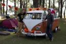 Laurens Kraal, left and Udo Van Heteren stand next to their Kombi van after driving from Bolivia to Brazil at the Oranjecamping site during the 2014 soccer World Cup in Sao Paulo, Brazil, Sunday, June 22, 2014. The group of seven Dutch men arrived at Sao Paulo after a 13-day journey from Bolivia in the orange hippie van that dates back to at least 45 years. (AP Photo/Dario Lopez-Mills)