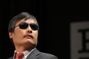 Chinese dissident Chen Guangcheng speaks to journalists following an appearance in New York