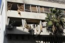 Damage on the labour union building is pictured after an explosion in Damascus