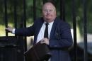 Britain's Communities Secretary Eric Pickles arrives at Number 10 Downing Street in London