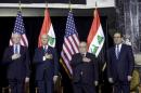 File photo of James Jeffrey, Joe Biden, Nuri al-Maliki and Jalal Talabani standing for the national anthem during one of several planned ceremonies to mark the end of American military presence in Iraq
