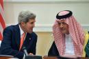 US Secretary of State John Kerry (L) speaks to Saudi Foreign Minister Prince Saud al-Faisal during a joint press conference on November 4, 2013 in Riyadh