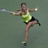 Victoria Azarenka, of Belarus, returns a shot to Samantha Stosur, of Australia, in the quarterfinals of the 2012 US Open tennis tournament, Tuesday, Sept. 4, 2012, in New York. (AP Photo/Kathy Willens)