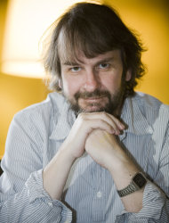 FILE - In this July 23, 2009 file photos, renowned New Zealand movie director Peter Jackson poses for a portrait in San Diego. Jackson, best known for his "Lord of the Rings" trilogy, said Friday, Oct. 28, 2011 that he was working with a high-profile former American death row inmate in hopes of getting the man a complete pardon. (AP Photo/Chris Park, File)