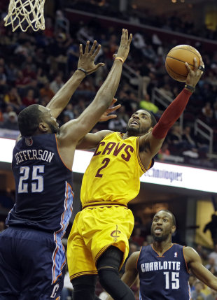 Kyrie Irving will have plenty of weapons surrounding him. (AP/Mark Duncan)