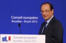 French President Francois Hollande arrives for a press conference at an EU Summit in Brussels, Friday, June 29, 2012. (AP Photo/Michel Euler)