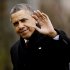 President Barack Obama waves to reporters as he steps off the Marine One helicopter and walks on the South Lawn at the White House in Washington, Thursday, Dec. 27, 2012, as he returns early from his Hawaii vacation for meetings on the fiscal cliff. (AP Photo/Charles Dharapak)
