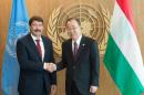 Hungary's President Janos Ader, left, meets with United Nations Secretary-General Ban Ki-moon, right, Saturday, Sept. 26, 2015 at United Nations headquarters. (AP Photo/Bryan R. Smith)
