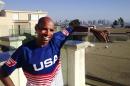 In this Tuesday, Sept. 30, 2014 photo, Meb Keflezighi poses for a photo in San Diego, Calif. Keflezighi already was a big-time marathoner, taking the silver medal at the 2004 Olympics and winning the New York City Marathon in 2009. Then came his inspirational victory in the Boston Marathon a year after the bombings there, and his life went stratospheric. (AP Photo/Bernie Wilson)