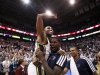 Utah Jazz guard Mo Williams is carried off the court by Utah Jazz forward Marvin Williams after hitting the game winning shot at the buzzer ending the second half of their NBA basketball game against the San Antonio Spurs in Salt Lake City