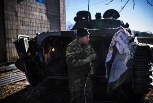 A pro-Russia separatist repairs a damaged BMP-2 infantry &hellip;