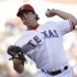 Texas Rangers starting pitcher Derek Holland throws during the fist inning of a baseball game against the Boston Red Sox on Friday, May 3, 2013, in Arlington, Texas. (AP Photo/LM Otero)