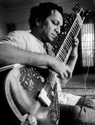 FILE - In this 1967 file photo, Ravi Shankar plays his sitar in Los Angeles. Shankar, the sitar virtuoso who became a hippie musical icon of the 1960s after hobnobbing with the Beatles and who introduced traditional Indian ragas to Western audiences over an eight-decade career, died Tuesday, Dec. 11, 2012. He was 92. (AP Photo, File)