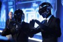 Musicians Banglater and de Homem-Christo of Daft Punk pose at the world premiere of the film "TRON: Legacy" in Hollywood, California