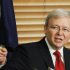 Australia's former Prime Minister Kevin Rudd reacts during a news conference at Parliament House in Canberra