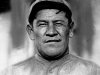 FILE - In this undated file photo, Jim Thorpe poses in a baseball uniform. The two surviving children of sports great Thorpe won a critical ruling on Friday, April 19, 2013, in federal court that could clear the way for his remains to be removed from a mausoleum in the Pennsylvania town that bears his name and reinterred on American Indian land in Oklahoma. (AP Photo/File)