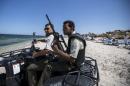 National guard members patrol at the beach near the Imperiale Marhaba hotel, which was attacked by a gunman in Sousse, Tunisia
