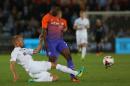 Kelechi Iheanacho (upright) fends off Mike van der Hoorn in Manchester City's match against Swansea City in Swansea on September 21, 2016
