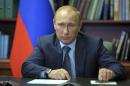Russian President Vladimir Putin attends a meeting with top officials in Blagoveshchensk