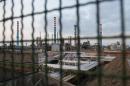 The Ilva steel plant seen through a fence in Taranto, Italy, on March 18, 2015