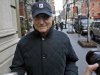FILE - In this Dec. 17, 2008 file photo, Bernard Madoff returns to his Manhattan apartment after making a court appearance in New York.  In December 2008, two of Bernard Madoff's most loyal employees met on a Manhattan street corner and fretted over a closely held secret that the rest of the world would learn about eight days later: that their boss, Madoff,  was a con man for the ages.  The exchange was recounted for the first time in a newly rewritten indictment this week expanding the case and charges against five defendants headed for a trial next year. The indictment brings into sharper focus the final few years of a fraud the government says dated to at least the early 1970s, two decades before Madoff claimed it began and well before 1992, when the government said in its original case against the defendants that the conspiracy began. (AP Photo/Jason DeCrow, File)