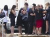 June Steenkamp is comforted after memorial service for daughter model Reeva at Victoria Park Crematorium in Port Elizabeth