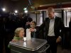 Labour Party PvdA leader Diederik Samsom casts his vote for parliamentary elections as his six-year-old son Benthe, left, and eleven-year-old daughter Fane, center rear, look on at a polling station in Leiden, central Netherlands, Wednesday Sept. 12, 2012. (AP Photo/Peter Dejong)
