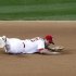 St. Louis Cardinals third baseman David Freese is unable to reach a single by San Francisco Giants' Buster Posey in the seventh inning during Game 3 of their MLB NLCS playoff baseball series in St. Louis