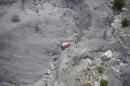 An aerial photo taken from a helicopter shows the crash site of the Germanwings Airbus A320 near Seyne-les-Alpes