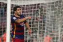 FC Barcelona's Luis Suarez reacts after scoring against Valencia during a semifinal, first leg, Copa del Rey soccer match at the Camp Nou stadium in Barcelona, Spain, Wednesday, Feb. 3, 2016. (AP Photo/Manu Fernandez)