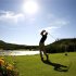 Ross Fisher of England tees off on the 17th hole during the Nedbank Golf Challenge in Sun City