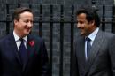 Britain's Prime Minister David Cameron greets the Emir of Qatar, Sheikh Tamim bin Hamad Al Thani, as he arrives at Number 10 Downing Street in London