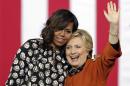 Support for 'my girl' Clinton is personal, Mrs. Obama says