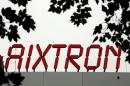 The logo of Aixtron SE is pictured on the roof of the German chip equipment maker's headquarters in Herzogenrath