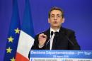UMP president and former French President Nicolas Sarkozy delivers a speech following the anouncement of results of the French departementales elections on March 29, 2015 in Paris