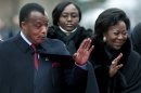 Congo President Denis Sassou Nguesso and his wife, Antoinette, arrive at a ceremony on October 23, 2010 in Montreux