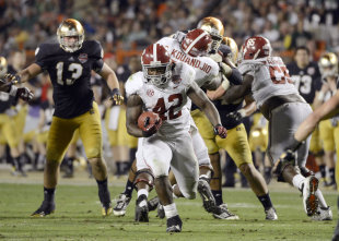 Crimson Tide running back Eddie Lacy ran for 140 yards and one TD against Notre Dame. (USA Today Sports)