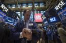 Traders work on floor of New York Stock Exchange