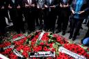 Mayors of the main opposition Peoples Republic Party (CHP) pray after laying wreaths in front of the Reina nightclub in Istanbul on January 4, 2017, three days after a gunman killed 39 people there on New Year's eve