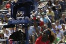 Serena Williams falls after an off-balance shot against Galina Voskoboeva of Kazakhstan during the second round of the 2013 U.S. Open tennis tournament, Thursday, Aug. 29, 2013, in New York. (AP Photo/Kathy Willens)