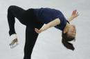 Yuna Kim of South Korea skates during a practice session at the figure stating practice rink at the 2014 Winter Olympics, Monday, Feb. 17, 2014, in Sochi, Russia. (AP Photo/Vadim Ghirda)