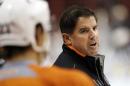 FILE - In this Sept. 12, 2013, file photo, Philadelphia Flyers head coach Peter Laviolette speaks to players during NHL hockey training camp in Philadelphia. The Nashville Predators hired the former Flyers' coach as their new coach on Tuesday, May 6, 2014, making him only the second head coach in the franchise's history. Laviolette, who signed a multi-year contract, will take over in Nashville once he finishes coaching the United States at the 2014 World Championship. (AP Photo/Matt Rourke, File)