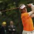Bernhard Langer of Germany hits his tee shot on the second hole during final round play in the 2013 Masters golf tournament in Augusta
