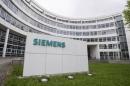 A Siemens logo is pictured on an office building of Siemens AG in Munich