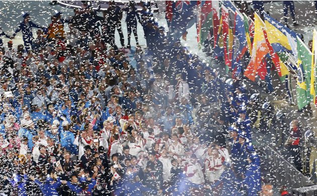 Confetti falls over athletes during the closing ceremony of the London 2012 Olympic Games at the Olympic Stadium
