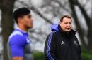 New Zealand's head coach Steve Hansen (R) looks as his players during a training session on November 24, 2016