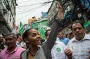 Marina Silva (C), presidential candidate for the Brazilian Socialist Party, walks at the Rocinha favela during her political campaign in Rio de Janeiro, Brazil, on August 30, 2014